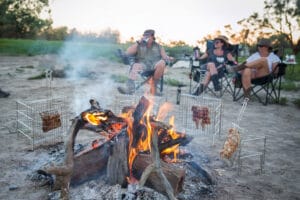 People laughing around a braai — what is a braai?