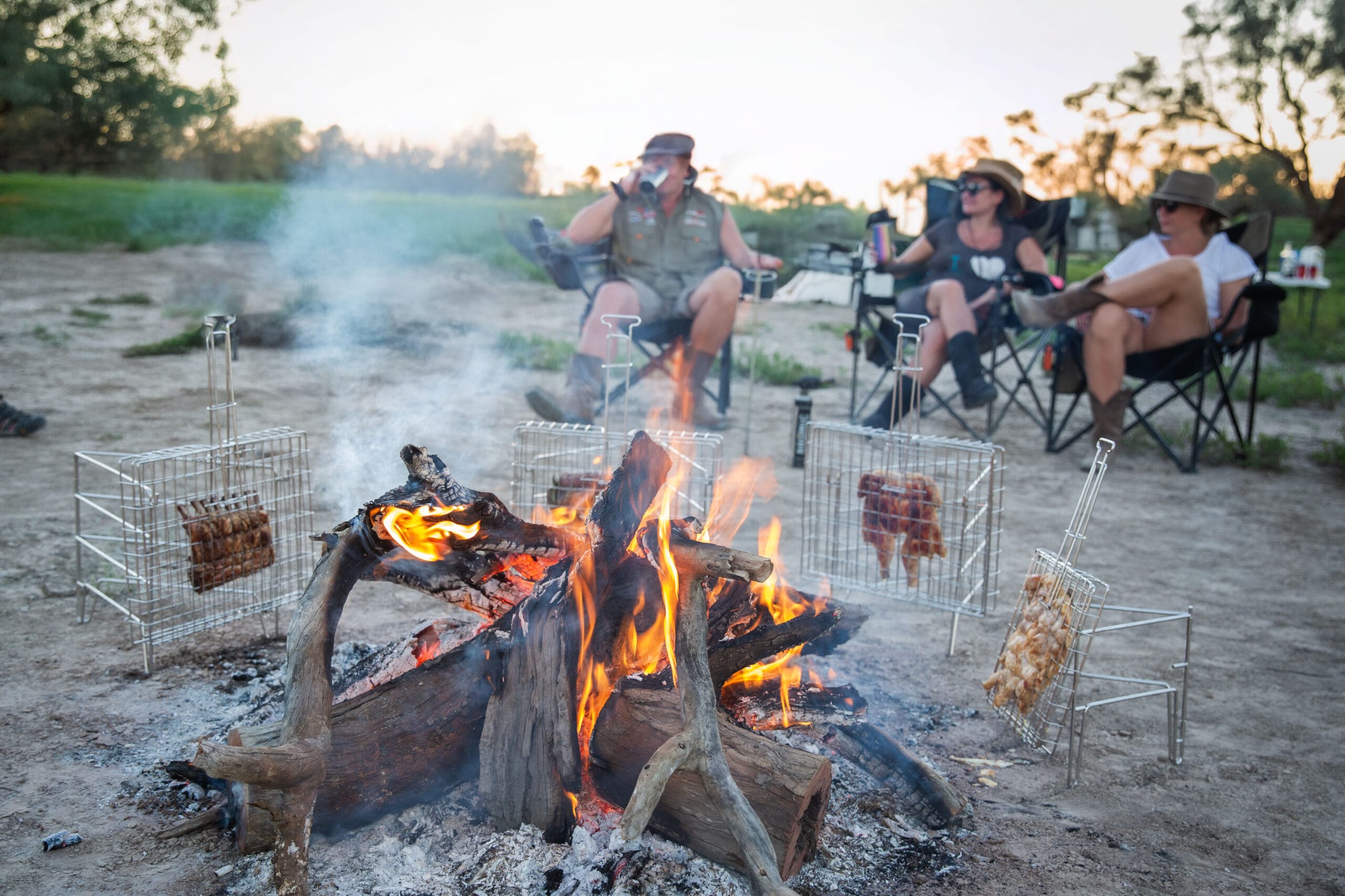 People laughing around a braai — what is a braai?