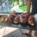 Bacon-wrapped jalapeño poppers on the Compact Braai