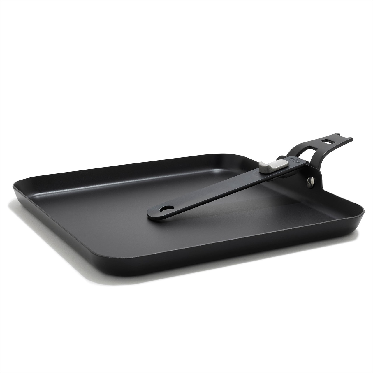 OXO Outdoor carbon steel griddle pan with the handle reversed for packing